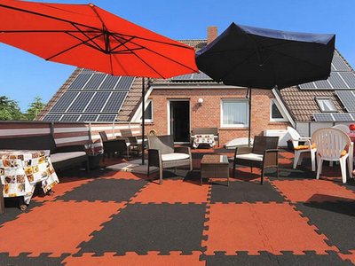 Покрытие для садового участка  из резиновых плиток-пазлов